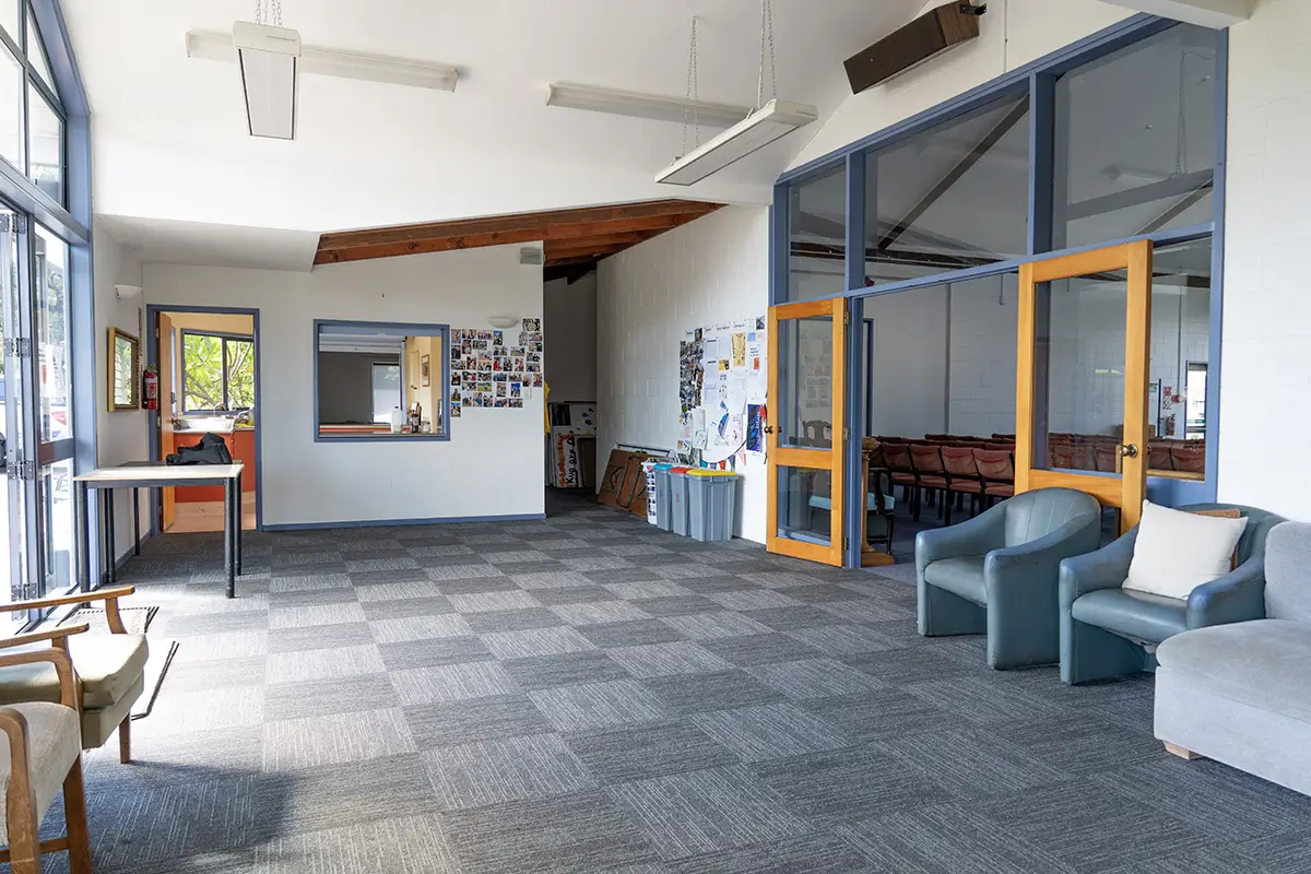 Foyer of St Mary's Glen Innes with double doors opening into the main auditorium